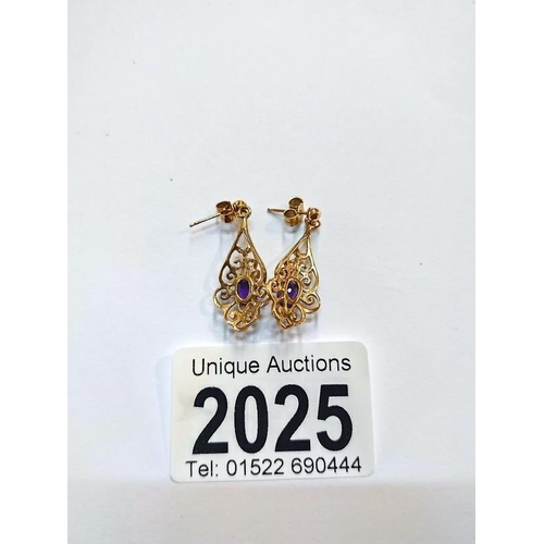 2025 - A pair of amethyst ear pendants in 9ct gold