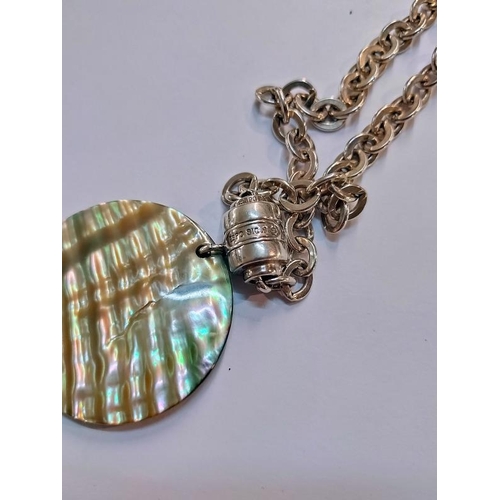 2037 - A silver link chain with attached mother of pearl pendant with a pull clasp