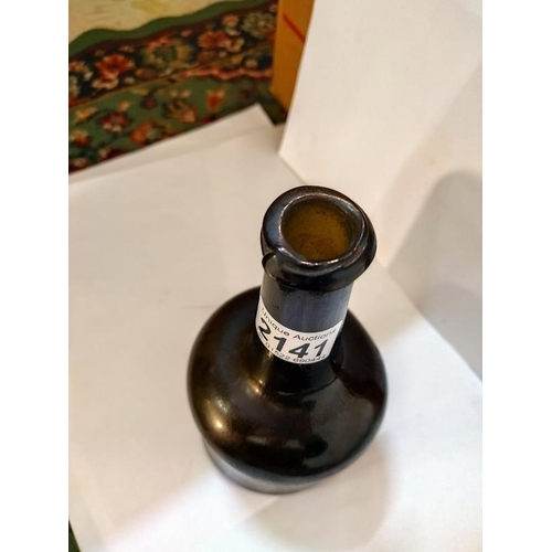 2141 - A mid 18th century wine bottle