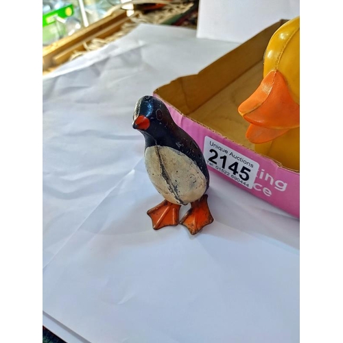 2145 - A die cast & tin plate clockwork penguin (height 8.5cm) & a plastic friction duck