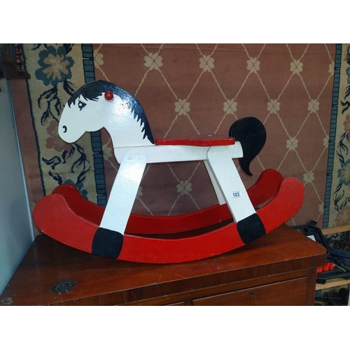 103 - A vintage painted wooden rocking horse Length 85cm, height 56cm, seat height 38cm, COLLECT ONLY.