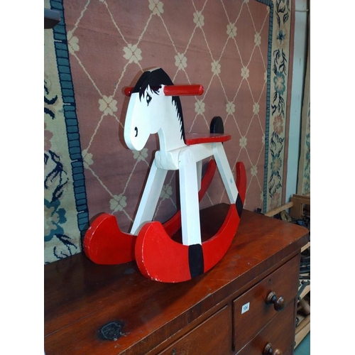 103 - A vintage painted wooden rocking horse Length 85cm, height 56cm, seat height 38cm, COLLECT ONLY.