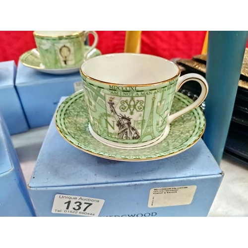 137 - 4  boxed Wedgwood cups and saucers 'Millenium'