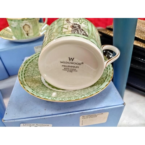 137 - 4  boxed Wedgwood cups and saucers 'Millenium'