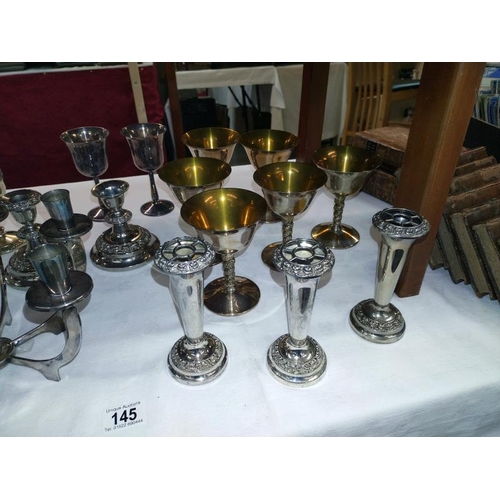 145 - A quantity of silver plate including art deco candleabra etc