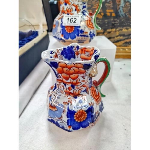 162 - A pair of Masons Ironstone jugs