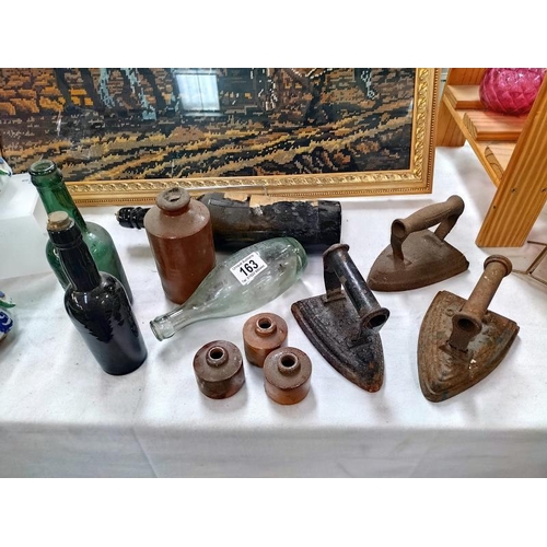 163 - 3 cast iron flat irons, stoneware, ink bottles and glass bottles, COLLECT ONLY.