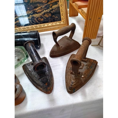 163 - 3 cast iron flat irons, stoneware, ink bottles and glass bottles, COLLECT ONLY.