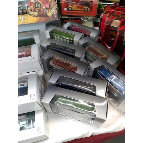 57 - A good selection of EFE diecast buses, Yesteryear vans and Matchbox G-5 gift set