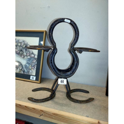 60 - Garden art made of horseshoes