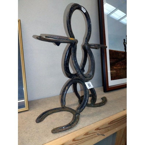 60 - Garden art made of horseshoes