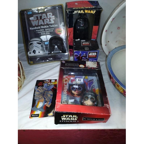 63 - A quantity of vintage Star Wars items all in packaging, includes walkie talkies, alarm clock etc