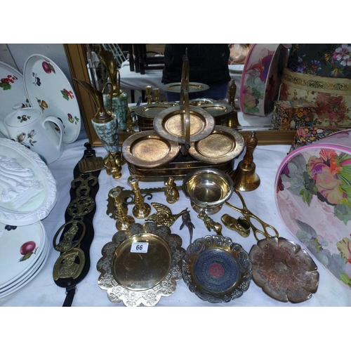 66 - A selection of brassware including candlesticks, cake stand etc