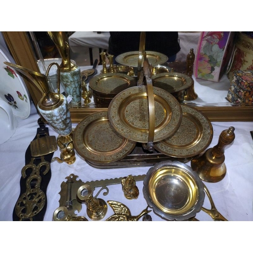 66 - A selection of brassware including candlesticks, cake stand etc