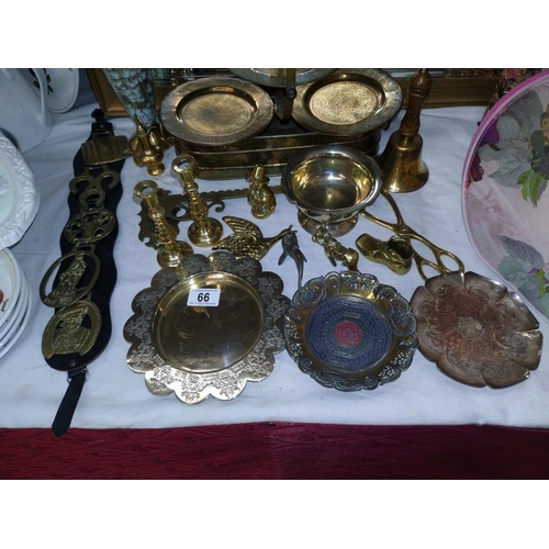 66 - A selection of brassware including candlesticks, cake stand etc