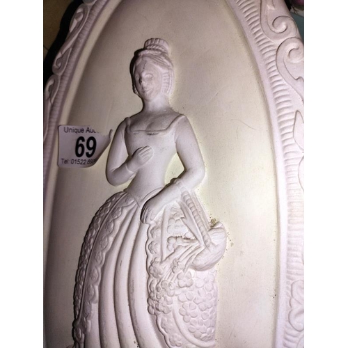 69 - A Classical style wall plaque of a lady (39cm x 19cm at widest), COLLECT ONLY.