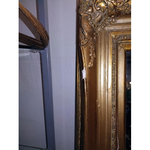 85 - An antique gilt framed bevel edged mirror (chip to frame) 74cm x 94cm, COLLECT ONLY.