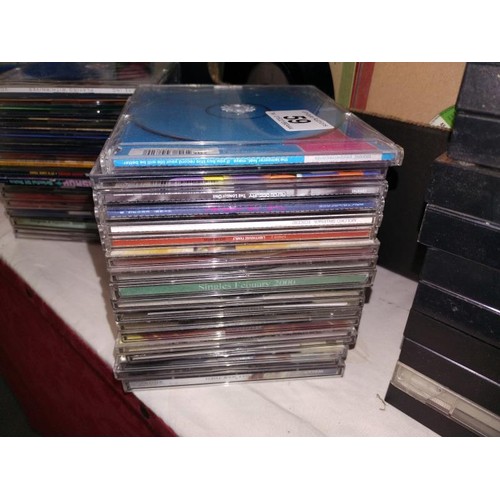 59 - A good lot of 45's single records, cd's and cassette tapes