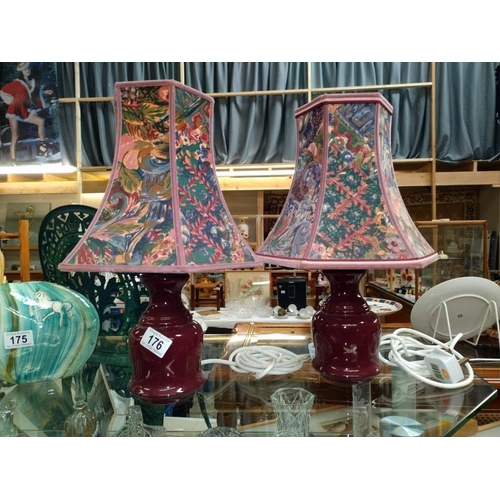 176 - A pair of red pottery table lamps with shades, COLLECT ONLY.