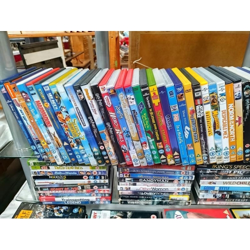 197 - Two crates. Over 100 DVDs including Harry Potter, Disney, Childrens , etc.  COLLECT ONLY.