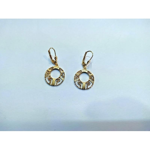 2047 - A pair of ear pendants in 14ct gold with open work drops