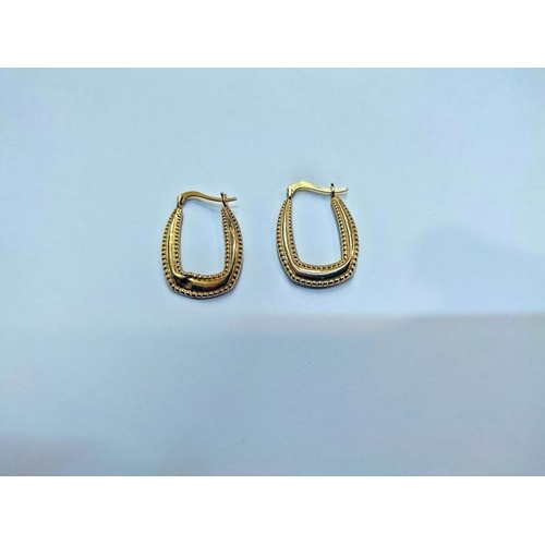 2052 - Two pairs of 9ct gold hoops. (One has slight dent)