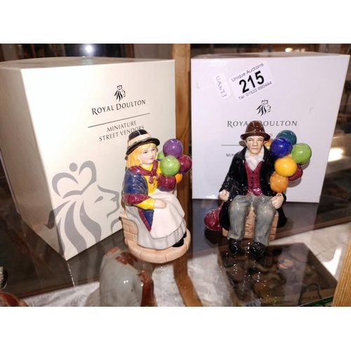 215 - Two boxed Royal Doulton figures, Balloon girl and Balloon man.