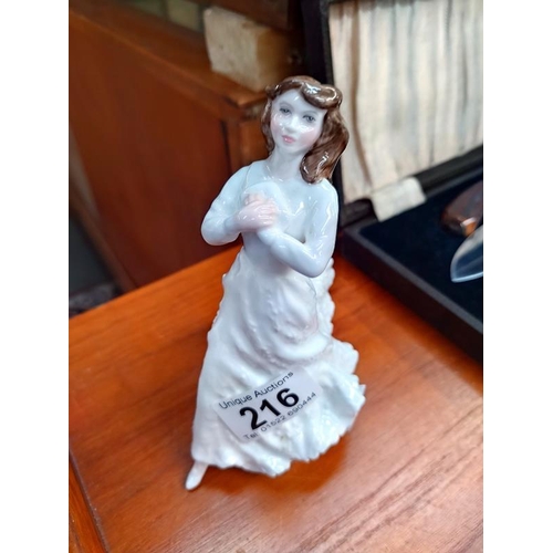 216 - A Royal Doulton figurine. Name obscured by makers label