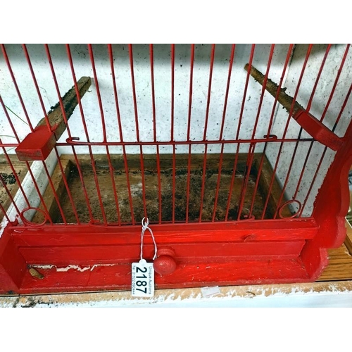 2187 - A vintage painted travellers bird cage. 69cm x 21cm x Height 31cm.  COLLECT ONLY.