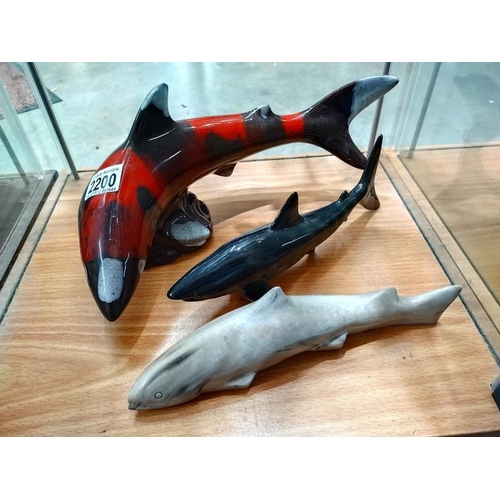 2200 - Two ceramic sharks and a stone shark