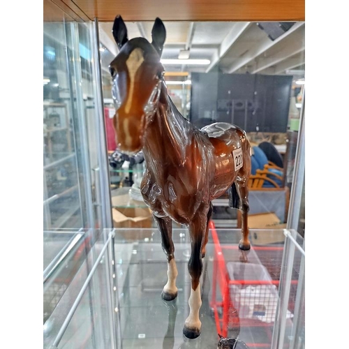 2201 - A Beswick horse figure. Height to ear tip, 28cm.  COLLECT ONLY.