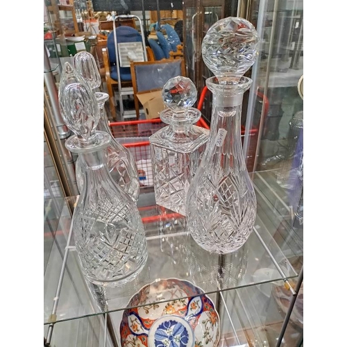 2207 - Four cut glass decanters, COLLECT ONLY.