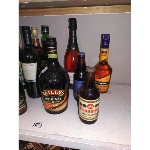 1073 - A selection of drink bottles including Baileys, Royal wedding Ale and Henninger export bier. COLLECT... 