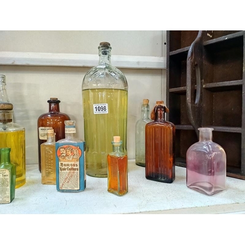 1098 - A quantity of old bottles/ medicine bottles and a butler tray.  COLLECT ONLY.