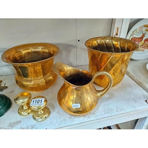 1101 - A selection of brass ware including planters, weights and cast iron scales etc.