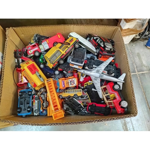 1104 - Two boxes of mixed play worn Diecast including Matchbox, Corgi and Majorette.