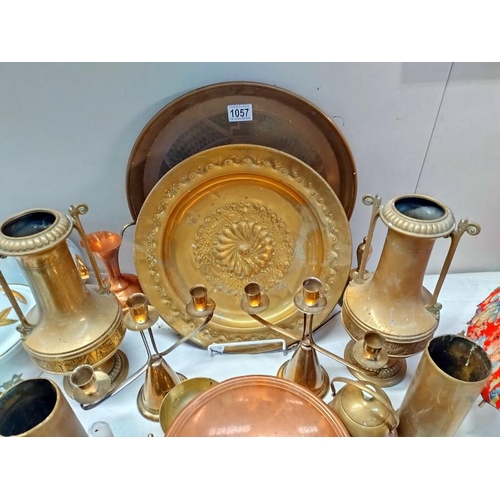 1057 - A selection of brassware including shell cases, carriage hub nut, etc  COLLECT ONLY.