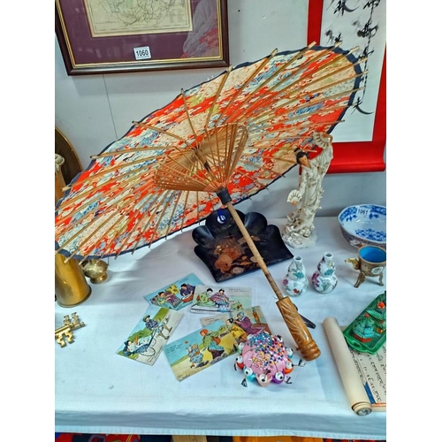 1061 - A mixed lot of oriental items including ceramics, parasol etc., COLLECT ONLY.