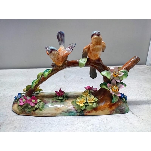 1077 - A Staffordshire fine bone China birds on a branch by J.T Jones and an Italian pottery pheasant. COLL... 