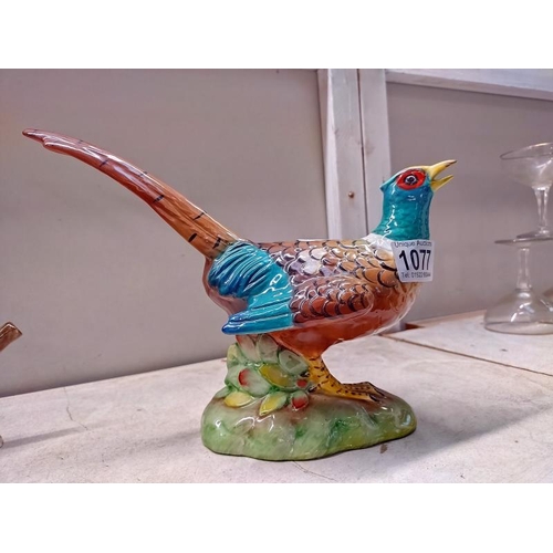 1077 - A Staffordshire fine bone China birds on a branch by J.T Jones and an Italian pottery pheasant. COLL... 