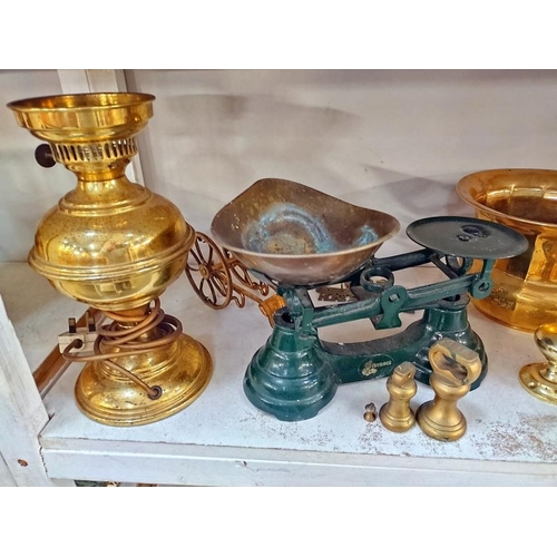 1101 - A selection of brass ware including planters, weights and cast iron scales etc.