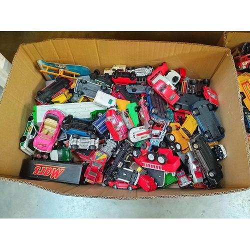 1104 - Two boxes of mixed play worn Diecast including Matchbox, Corgi and Majorette.