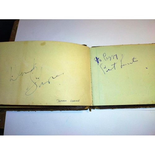 2093 - An excellent autograph book including:
Walt Disney, Buster Keaton, Burt Lancaster, Dinah Shore, Mary... 