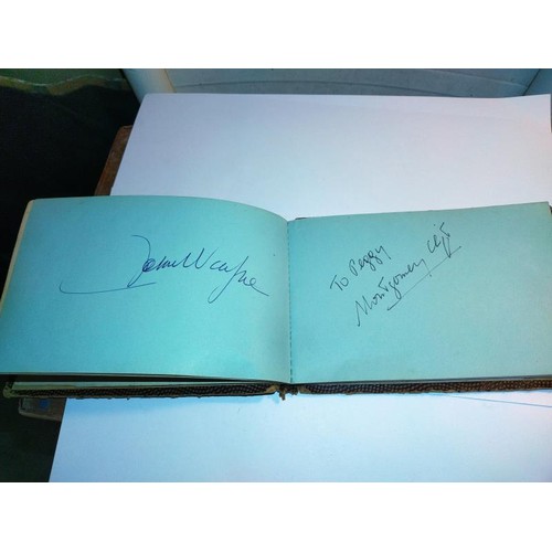 2093 - An excellent autograph book including:
Walt Disney, Buster Keaton, Burt Lancaster, Dinah Shore, Mary... 