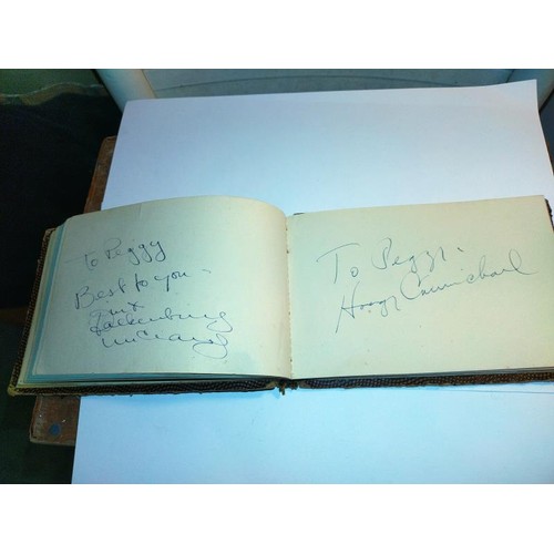 2093 - An excellent autograph book including:
Walt Disney, Buster Keaton, Burt Lancaster, Dinah Shore, Mary... 