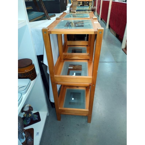 235 - A pair of pine 3 tier shelf units with glass shelves. 30cm x 35cm x 79cm., COLLECT ONLY.