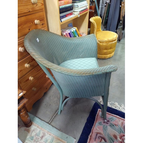 265 - A Lloyd Loom Lusty arm chair.  COLLECT ONLY.