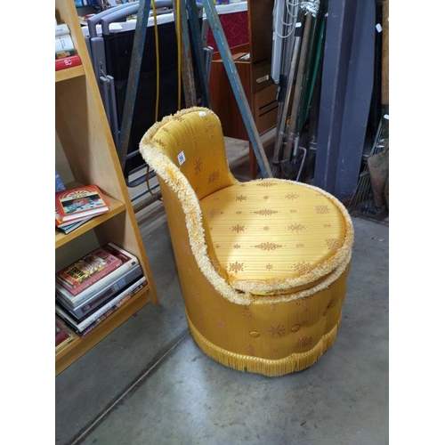 266 - A gold fabric tub chair.  COLLECT ONLY.