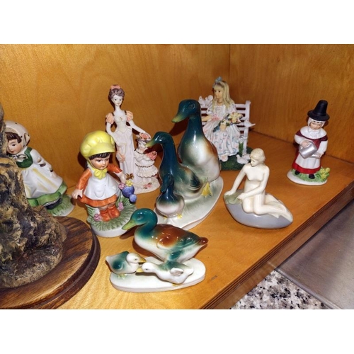 274 - A quantity of ornaments including Goebel boys, birds, etc.  COLLECT ONLY.