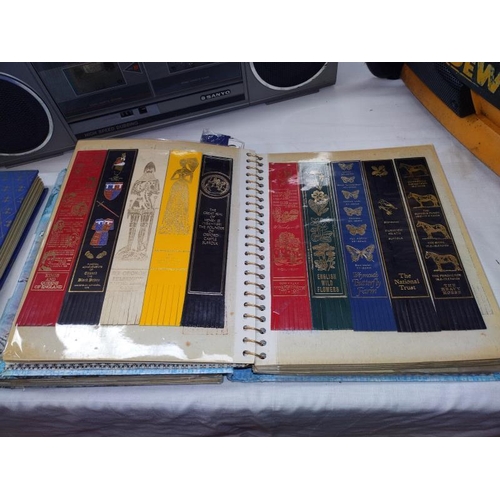 346 - Three folders of leather, card and plastic bookmarks